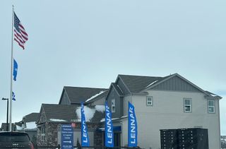 A stylish model home with a welcoming façade in Macanta: The Grand Collection by Lennar (Castle Rock, CO).