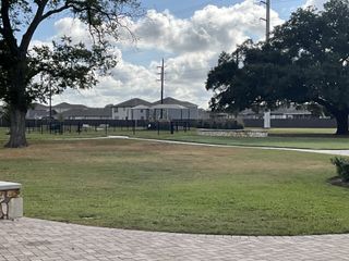 A scenic view of the lush green landscape and community amenities, perfect for outdoor enjoyment.