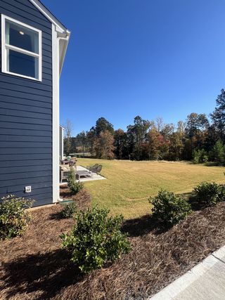 Street view A charming home with a spacious lawn in Laurelbrook by M/I Homes, Sherrills Ford, NC.