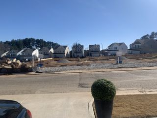 Under-construction homes in Harlowe Point by Lennar with spacious lots and future potential in Durham, NC.