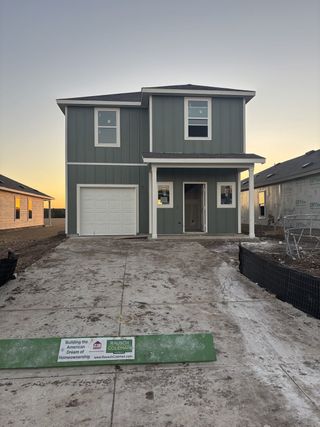 A modern two-story home with a single garage in Hidden Oasis by Lennar, San Antonio, TX.