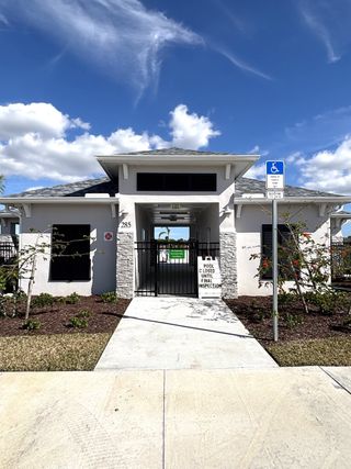 A modern recreational facility in St. Johns Preserve by Landsea Homes, Palm Bay, FL, featuring sleek architecture and landscaping.