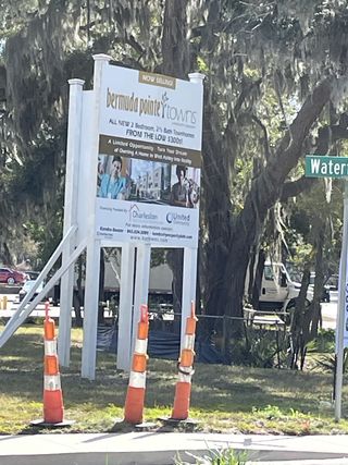 New townhomes at Bermuda Pointe Towns by Prosperity Builders, set amidst lush scenery in Charleston, SC.