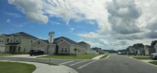 Charming homes with landscaped yards in a peaceful neighborhood at Millwood: Millwood Estates - The Meadows by Lennar (Ocala, FL).