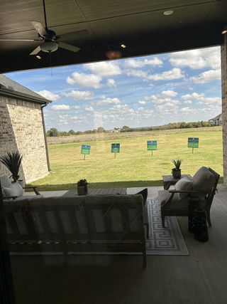 A cozy outdoor patio with plush seating and scenic views. Perfect for relaxing while enjoying the serene landscape.