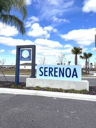 Welcome to Cypress Bay West Freedom by D.R. Horton, a scenic community in Palm Bay, FL, with serene surroundings.