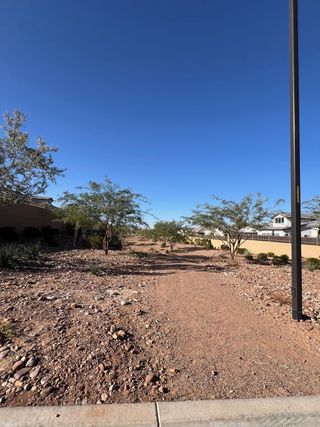 A scenic desert landscape pathway in the Reserve at Red Rock: Vintage Collection by Blandford Homes (Mesa, AZ).