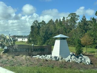 A welcoming entrance to Colbert Landings by Taylor Morrison, surrounded by greenery in Palm Coast, FL.