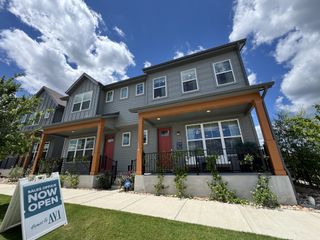 Charming modern townhouse with inviting porch in Goodnight Ranch by Homes by Avi (Austin, TX).