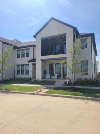 Street view A modern two-story home with a cozy porch and balcony in Hazelwood by CB JENI Homes (Frisco, TX).