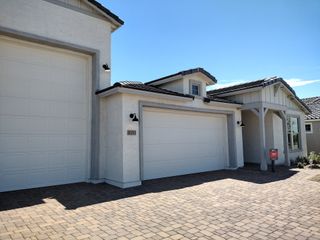 A modern home with elegant design and spacious garages in Artisan at Asante by Taylor Morrison (Surprise, AZ).