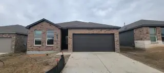 A charming brick home with modern features in Stone Garden: Stonehill Collection by Lennar (San Antonio, TX).