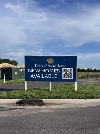 Street view New homes available in Amberly by Dream Finders Homes, Green Cove Springs, FL.