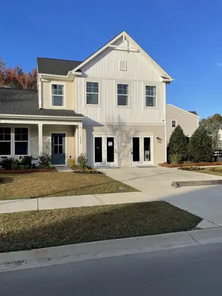 Street view A charming two-story home with a landscaped yard in Oak Pointe Single Family Homes by Stanley Martin Homes (Hanahan, SC).