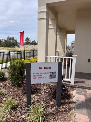 The Baldwin model at Harvest at Ovation by Taylor Morrison, featuring modern architecture with scenic views in Winter Garden, FL.