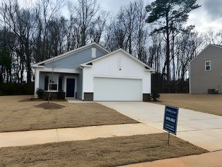 Street view Charming modern home with a two-car garage and spacious yard in Bryson's Ridge by Starlight Homes (Spring Hope, NC).