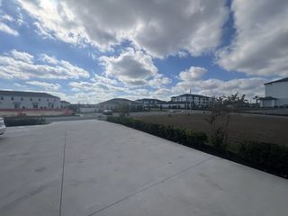 Spacious development area under a vibrant sky in Danbury at Ridgewood Lakes by D.R. Horton, Davenport, FL.