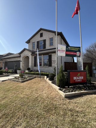 A charming brick home with modern touches in Lake Pointe at Paloma Creek by Beazer Homes (Little Elm, TX).