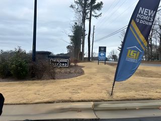 Street view Discover The Meadows at Oxford by LGI Homes, featuring new homes in a serene Oxford, NC setting.