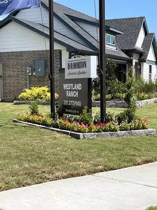 Charming brick home with landscaped garden in Lakes at Westland Ranch by D.R. Horton (League City, TX).