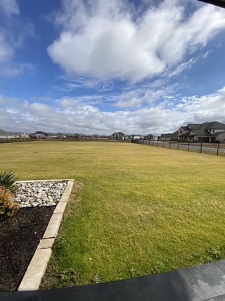 Wide open green space with a clear blue sky in Ridge Park Estates by GFO Home, Royse City, TX.