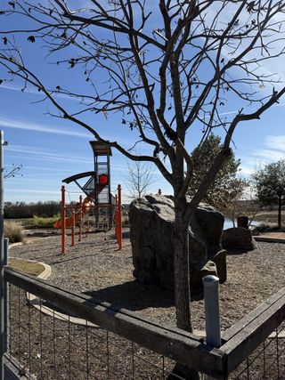 Community Amenities A scenic playground with climbing structures in Orchard Ridge by Pacesetter Homes (Liberty Hill, TX).