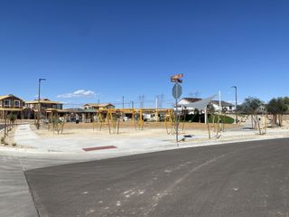 Newly developed community park with play area in The Villas Collection at Frontera by New Home Co. (Surprise, AZ).