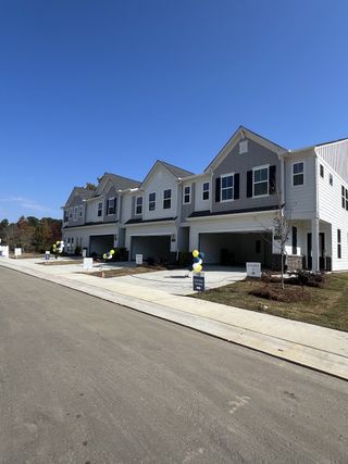Elegant townhomes with charming facades in Galloway Towns by Pulte Homes, located in beautiful Charlotte, NC.