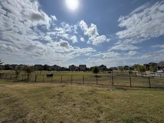 A spacious fenced dog park in Durango Farms offers a safe and fun outdoor space for pets and their owners to enjoy.