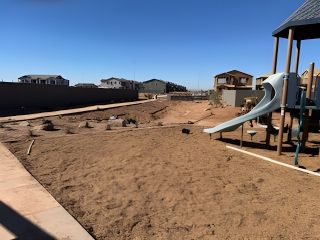 Community Amenities A developing play area near new homes in Hawes Crossing: Discovery by Lennar, Mesa, AZ, featuring playground equipment.