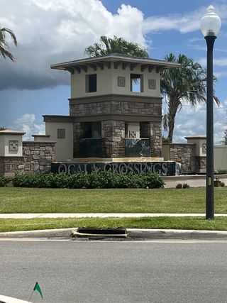 A modern stone entrance with waterfalls in Ocala Crossings South by D.R. Horton, located in beautiful Ocala, FL.
