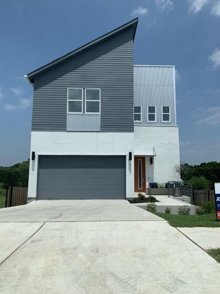 A modern home with unique angles and a sleek design in Agave by InTown Homes (Austin, TX).