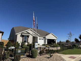 A charming modern home with a manicured yard in 6 Creeks by Pulte Homes, Kyle, TX.