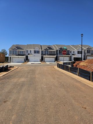Newly constructed townhomes with modern designs in Waypoint by D.R. Horton, Flowery Branch, GA.