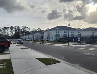 Street view Modern street view with contemporary homes and tidy sidewalks in Wyndbrook by D.R. Horton (Jacksonville, FL).