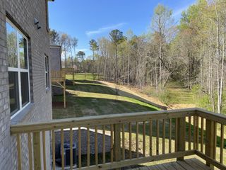 A charming home with a scenic wooded view in Broder Farm by D.R. Horton, Stockbridge, GA.
