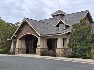 A charming rustic clubhouse with stone accents in Handsmill on Lake Wylie by Kolter Homes (York, SC).