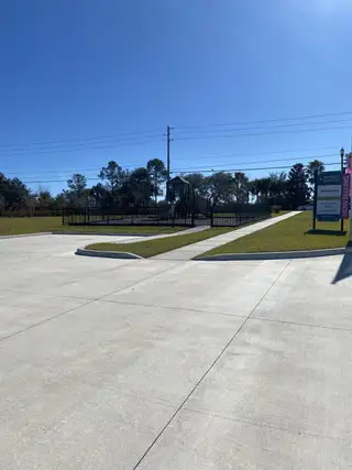 Street view A lovely community park with play area and clear blue skies in Brookshire by Stanley Martin Homes (Titusville, FL).