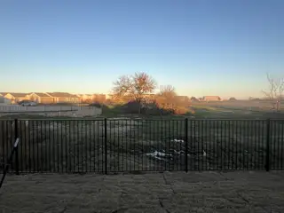 A scenic view of open fields and homes in Foree Ranch: Watermill Collection by Lennar, Providence Village, TX.