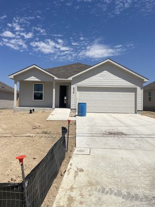 Street view Charming modern home with a spacious driveway in Tarasco Gardens by Lennar (San Antonio, TX).