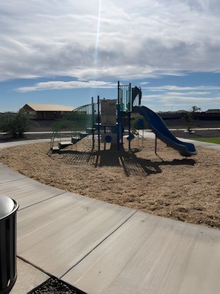 A charming playground in Artisan at Asante by Taylor Morrison, offering family-friendly fun in Surprise, AZ.