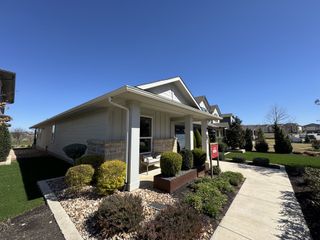 A charming single-story home with a manicured yard in Easton Park 60s by Taylor Morrison (Austin, TX).