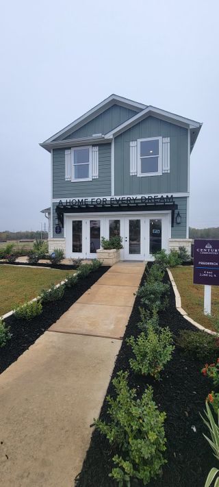 A charming two-story home with landscaped entry in Spring Creek by Century Communities (San Antonio, TX).
