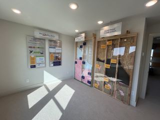 An informative homebuyer resource center displaying benefits of new construction in Solterra by David Weekley Homes (Mesquite, TX).