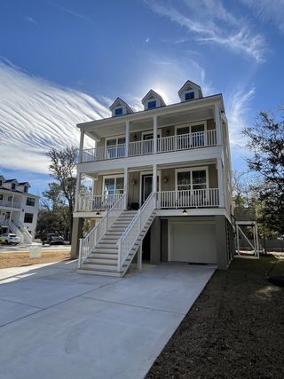 A charming elevated home with dual balconies in Wando Forest by J.Meyer Homes (Mount Pleasant, SC).