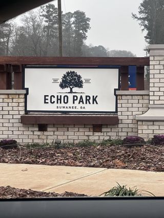 Welcome to Echo Park by UnionMain Homes in Suwanee, GA—charm meets nature in this inviting community.