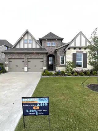 A charming brick home with modern design in Elevon by Pacesetter Homes (Lavon, TX).