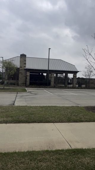 A modern pavilion with stone accents and a metal roof in Bridgewater: Classic Collection by Lennar (Princeton, TX).