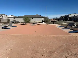 A welcoming community area with seating in North Copper Canyon by Oakwood Homes Co (Surprise, AZ).