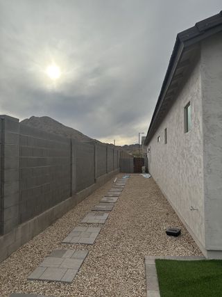 A modern home exterior with mountain views in Pinnacle at San Tan Heights by Mattamy Homes, San Tan Valley, AZ.